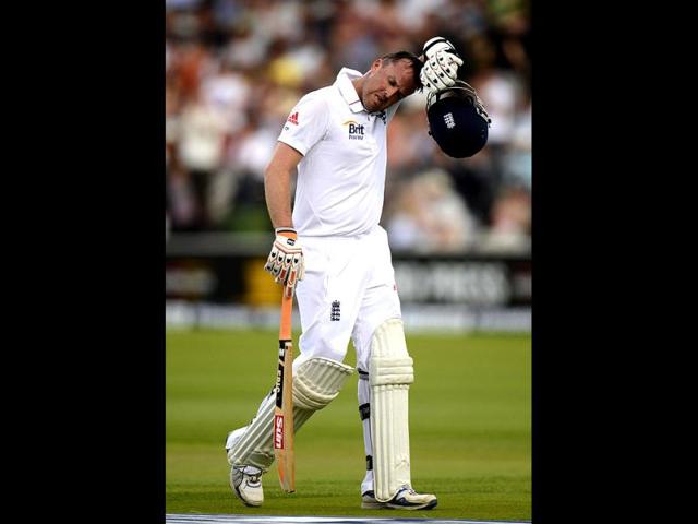 England's Graeme Swann leaves the field after being run out during the third cricket Test match against South Africa at Lord's in London. Reuters/Philip Brown