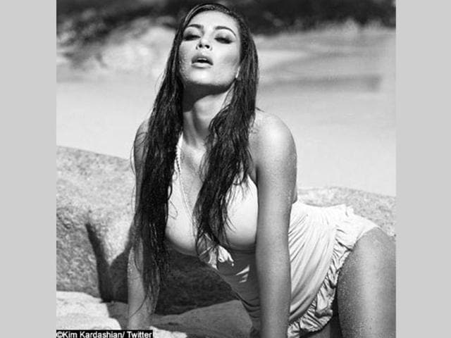 Kim Kardashian oozed oomph, as she posed in a bikini on a beach. Check out the beauty at her hottest best.