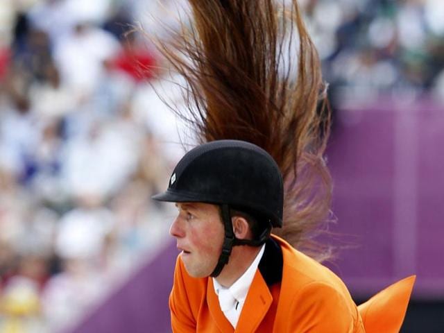 Netherlands' Gerco Schroder riding London performs during the equestrian individual jumping final at the London 2012 Olympic Games in Greenwich Park. Reuters Photo Netherlands' Gerco Schroder riding London performs during the equestrian individual jumping final at the London 2012 Olympic Games in Greenwich Park. Reuters Photo
