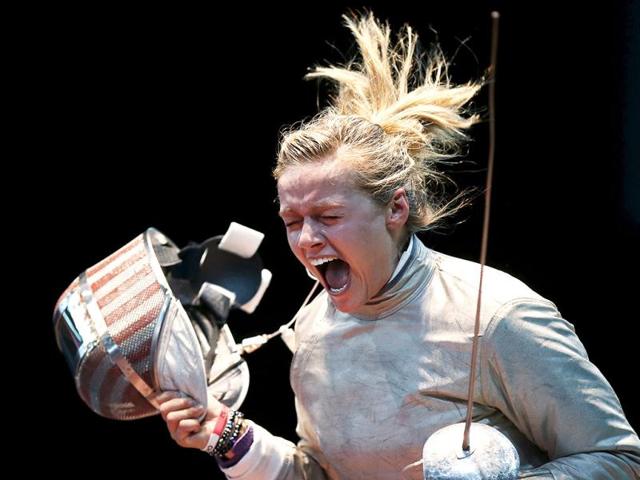Dagmara Wozniak of the US celebrates her victory against Tunisia's Azza Besbes during their women's sabre individual round of 16 fencing competition at the ExCel venue at the London 2012 Olympic Games. Reuters Photo Dagmara Wozniak of the US celebrates her victory against Tunisia's Azza Besbes during their women's sabre individual round of 16 fencing competition at the ExCel venue at the London 2012 Olympic Games. Reuters Photo