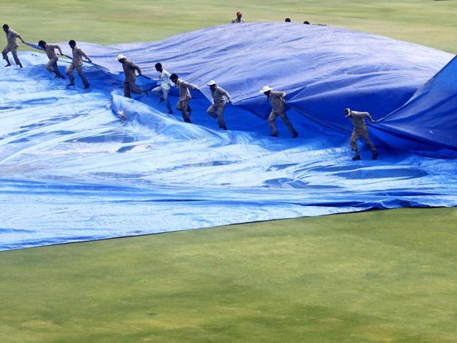 Groundsmen-remove-a-raincover-from-the-field-after-a-rain-delay-during-the-third-day-of-the-first-test-cricket-match-between-India-and-New-Zealand-in-Hyderabad-Reuters-Vivek-Prakash Groundsmen-remove-a-raincover-from-the-field-after-a-rain-delay-during-the-third-day-of-the-first-test-cricket-match-between-India-and-New-Zealand-in-Hyderabad-Reuters-Vivek-Prakash