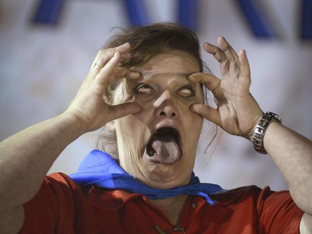 A participant in the Concurso de Feos (Ugly Competition), organised by the Txosna Moskotarrak, performs during the Aste Nagusia (Great Week) fiestas in Bilbao. Reuters Photo