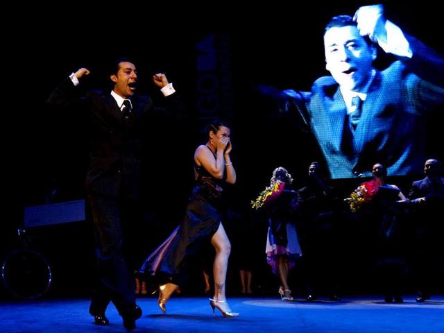 Facundo de la Cruz Gomez Palavecino (L) and Paola Sanz from Argentina react after winning the Tango World Championship in Salon style in Buenos Aires. REUTERS/Marcos Brindicci