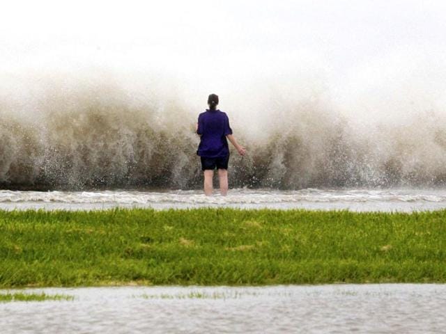 New Orleans resident Diana Whipple stands on the shore of Lake Pontchartrain as hurricane Isaac approaches New Orleans, Louisiana. Reuters Photo New Orleans resident Diana Whipple stands on the shore of Lake Pontchartrain as hurricane Isaac approaches New Orleans, Louisiana. Reuters Photo