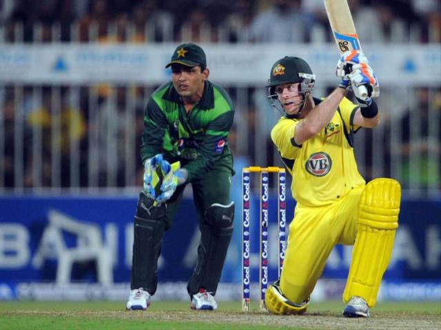 Australian-cricketer-Glenn-Maxwell-R-plays-a-shot-as-Pakistani-wicketkeper-Kamran-Akmal-looks-on-during-their-first-One-Day-International-cricket-match-at-the-Sharjah-cricket-stadium-AFP-Aamir-Qureshi Australian-cricketer-Glenn-Maxwell-R-plays-a-shot-as-Pakistani-wicketkeper-Kamran-Akmal-looks-on-during-their-first-One-Day-International-cricket-match-at-the-Sharjah-cricket-stadium-AFP-Aamir-Qureshi
