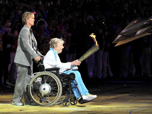 Former Paralympic archer, Margaret Maughan, lights the cauldron in the Olympic Stadium during the opening ceremony of the London 2012 Paralympic Games. Reuters Photo Former Paralympic archer, Margaret Maughan, lights the cauldron in the Olympic Stadium during the opening ceremony of the London 2012 Paralympic Games. Reuters Photo