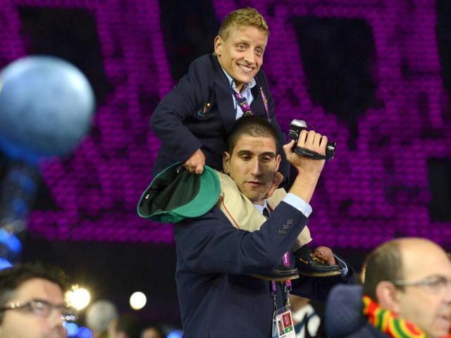 Members of Portugal's delegation parade during the opening ceremony of the London 2012 Paralympic Games at the Olympic Stadium in east London. AFP Photo Members of Portugal's delegation parade during the opening ceremony of the London 2012 Paralympic Games at the Olympic Stadium in east London. AFP Photo