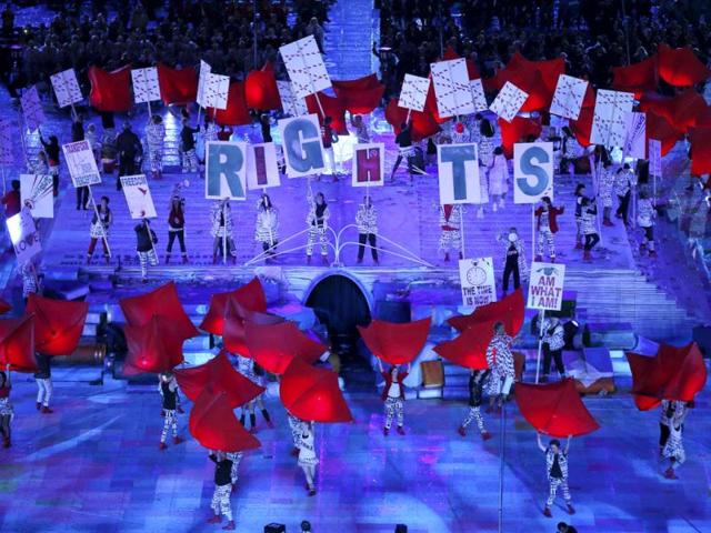 Performers hold placards as they take part at the opening ceremony of the London 2012 Paralympic Games in the Olympic Stadium. Reuters Photo Performers hold placards as they take part at the opening ceremony of the London 2012 Paralympic Games in the Olympic Stadium. Reuters Photo