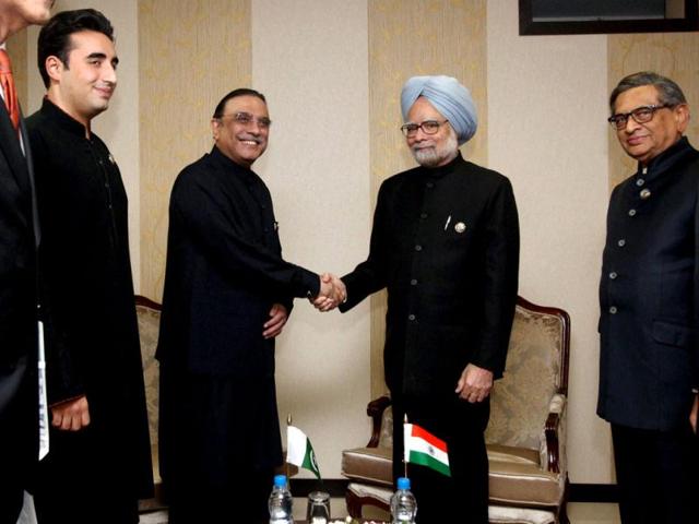 Prime Minister Manmohan Singh shakes hands with Pakistani President Asif Ali Zardari during a meeting in Tehran, Iran. Also seen in the picture are Indian foreign minister SM Krishna and Bilawal Bhutoo Zardari son of Pakistani President. PTI/Atul Yadav