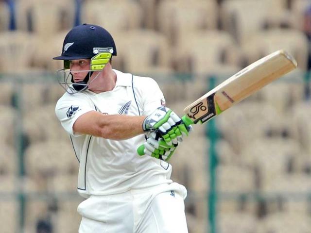 New Zealand batsman Martin Guptill strikes the ball to the boundary on the first day of their second Test match against India at the M Chinnaswamy Satdium in Bangalore. AFP/Manjunath Kiran