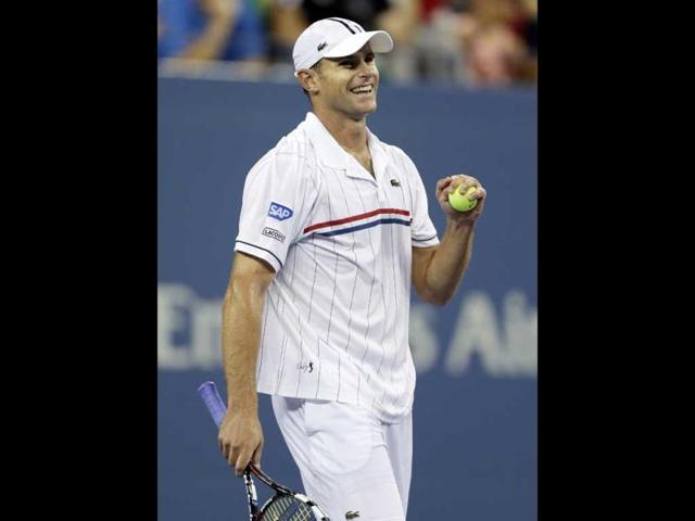 Andy Roddick reacts after his match against Australia's Bernard Tomic in the third round of play at the 2012 US Open tennis tournament, in New York. AP Photo/Charles Krupa