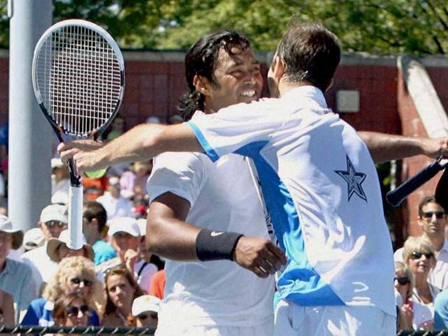 Leander Paes and his partner Radek Stepanek celebrate after winning the 1st round of Men's Doubles Tennis match against Dustin Brown and Christopher Kas at US Open Tennis Tournament. PTI Photo