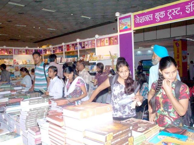 Visitors at National Book Trust stall at the 18th Delhi Book Fair 2012, Pragati Maidan in New Delhi. UNI Photo