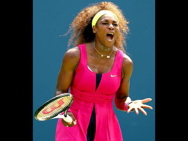 Serena Williams of the United States reacts against Ekaterina Makarova of Russia during their women's singles third round match on Day Six of the 2012 US Open at USTA Billie Jean King National Tennis Center, New York City. Elsa/Getty Images/AFP