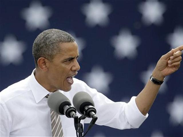 US President Barack Obama speaks during a campaign stop at the Living History Farms in Des Moines, Iowa. AP Photo/Charlie Riedel