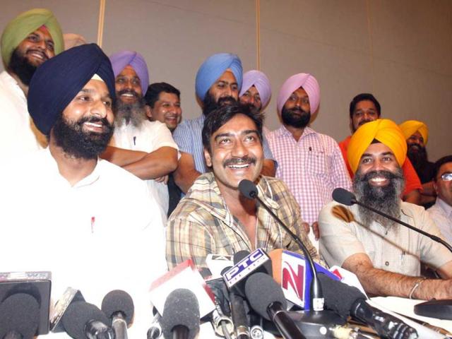 Film star Ajay Devgn reacting while talking to media after meeting with Sikh leaders over the controversy of his upcoming movie “Son of Sardar” in Amritsar, India.(Hindustan Times/Munish Byala)
