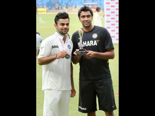 Man-of-the-Match-Virat-Kohli-and-Man-of-the-Series-R-Ashwin-pose-for-lensmen-after-India-won-the-2nd-test-match-and-series-against-New-Zealand-in-Bangalore-PTI-Photo-by-Shailendra-Bhojak