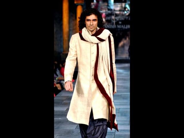 Imtiaz Ali walks at the fashion show for The Mijwan Welfare Society. (Photo: AFP)