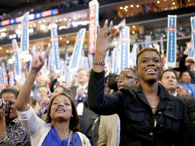 Delegates cheer as first lady Michelle Obama addresses the Democratic National Convention in Charlotte, North Carolina. AP/Jae C Hong