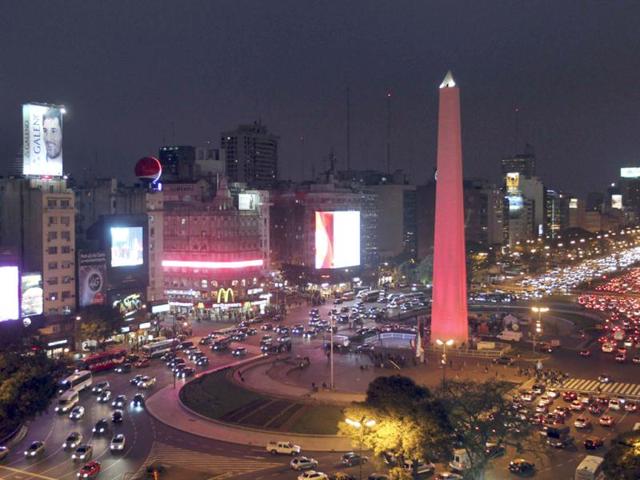The Obelisk is lighted up in red, as part of a campaign to raise awareness in cardiovascular diseases driven by the City's government, in the city of Buenos Aires. (Reuters)