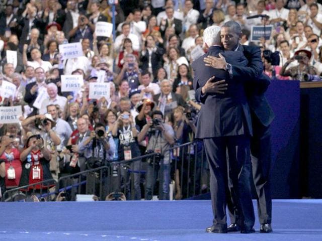 US President Barack Obama embraces former President Bill Clinton onstage after Clinton nominated Obama for re-election during the second session of the Democratic National Convention in Charlotte, North Carolina. Reuters/Jessica Rinaldi
