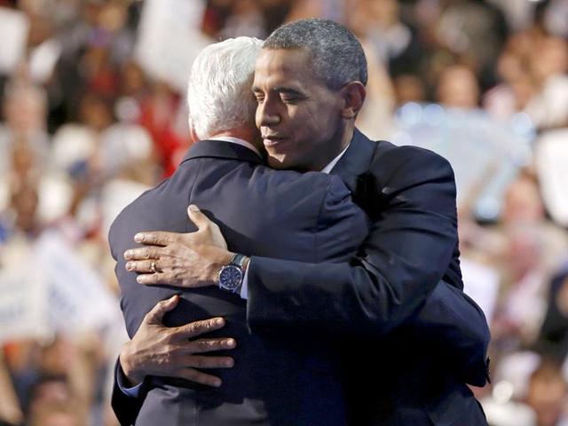 US President Barack Obama embraces former President Bill Clinton onstage after Clinton nominated Obama for re-election during the second session of the Democratic National Convention in Charlotte, North Carolina. Reuters/Larry Downing