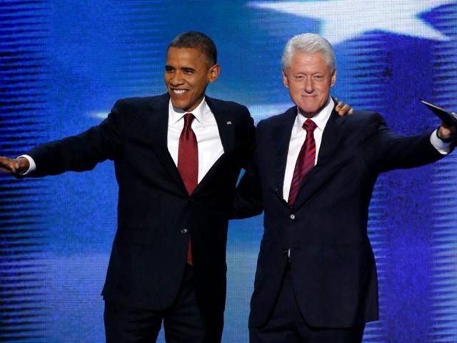 US President Barack Obama joins former President Bill Clinton onstage after Clinton nominated Obama for re-election during the second session of the Democratic National Convention in Charlotte, North Carolina. Reuters/Jason Reed