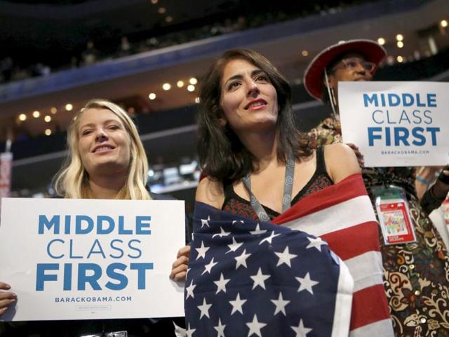 Delegates watch as former President Bill Clinton addresses the Democratic National Convention in Charlotte, North Carolina. AP/Jae C Hong