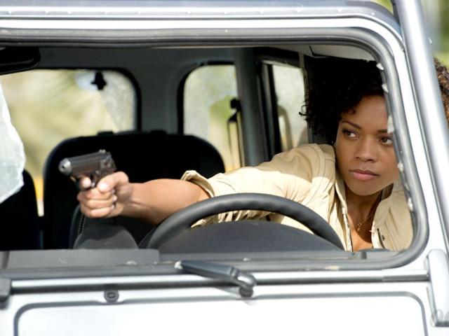 Naomie Harris calls her role that of a 'female Bond' in the film.