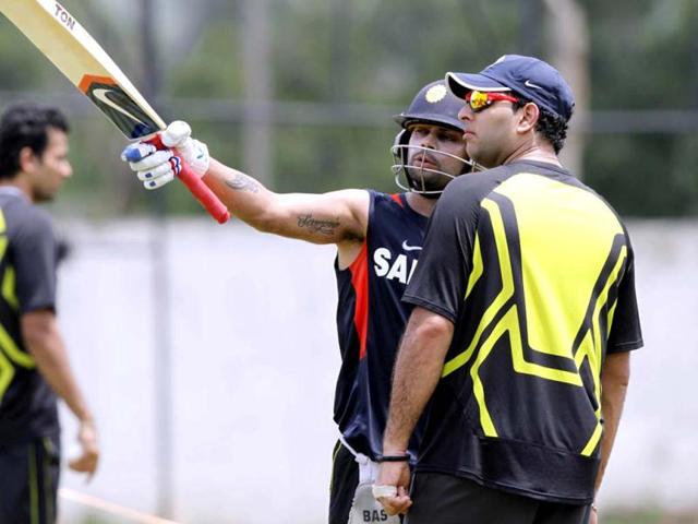 Yuvraj Singh and Virat Kohli during practice session ahead of T20 cricket match between India and New Zealand in Visakhapatnam. HT Photo/Ashok Nath Dey