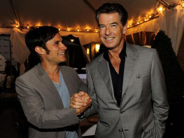 Mexican actor Gael Garcia Bernal mingles with actor Pierce Brosnan at the Sony Pictures Classics party at the 2012 Toronto Film Festival. AP/Chris Pizzello