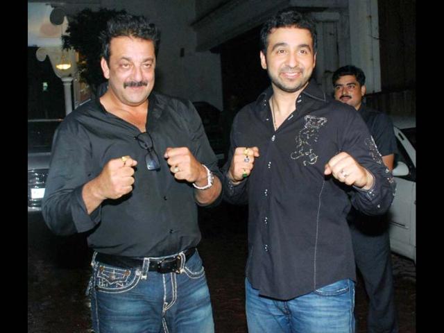 Sanjay Dutt poses with birthday boy Raj Kundra.