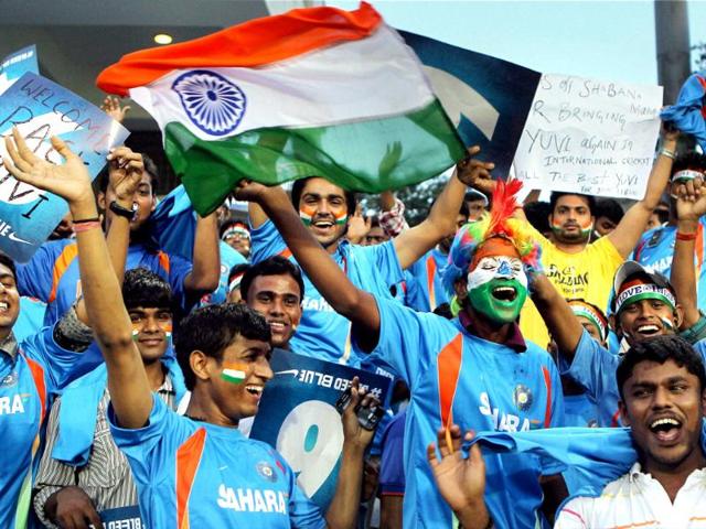 Cricket fans cheer before the start of T-20 match between India and New Zealand at MAC Stadium in Chennai. PTI/R Senthil Kumar
