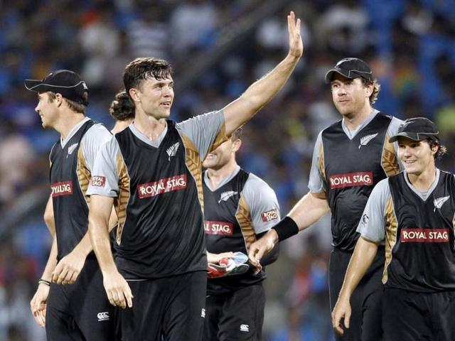 New Zealand cricketer James Franklin, second left, and teammates celebrate after winning the Twenty20 international cricket match against India in Chennai. AP/Arun Sankar K