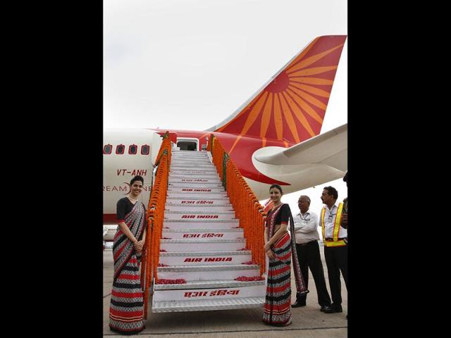 Air-India-flight-attendants-stand-at-the-base-of-stairs-during-the-unveiling-of-Air-India-s-first-Boeing-787-Dreamliner-HT-Sanjeev-Verma Air-India-flight-attendants-stand-at-the-base-of-stairs-during-the-unveiling-of-Air-India-s-first-Boeing-787-Dreamliner-HT-Sanjeev-Verma
