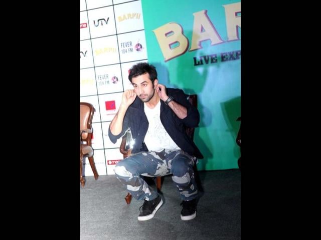 Apologising for something? Ranbir Kapoor doing situps at the Barfi! promotions.