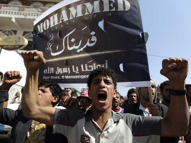 A protester chants slogans during a protest march to the US embassy in Sanaa. Reuters/Mohamed al-Sayaghi