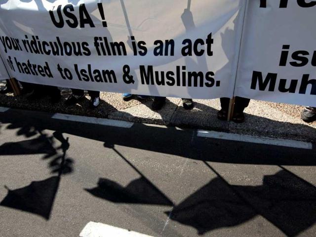 Arab-Israeli Muslim men protest in front of the US embassy in the Mediterranean coastal city of Tel Aviv. AFP/Jack Guez