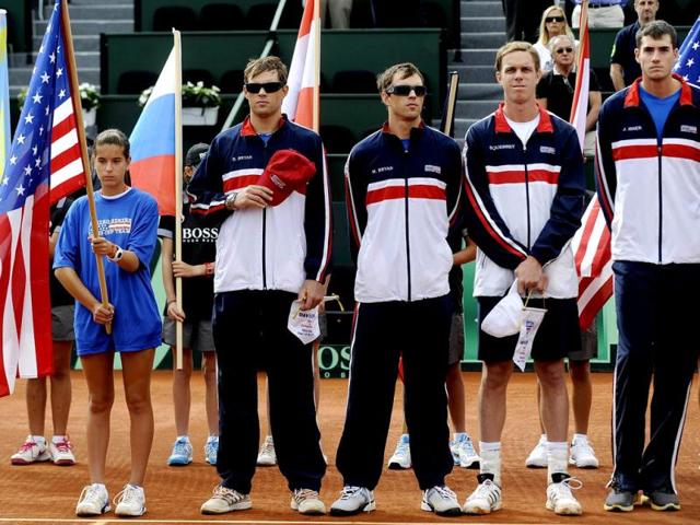 (From right) US tennis players John Isner, Sam Querrey, Mike Bryan and Bob Bryan pose before the first match of the Davis Cup semi-final Spain vs USA at the Hermanos Castro park court in Gijon, northern Spain, on September 14, 2012. AFP Photo