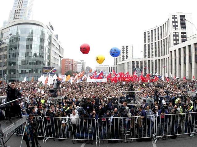 Opposition supporters stand in front of the stage during the "March of Millions" protest rally against President Vladimir Putin in Moscow. Reuters/Mikhail Voskresensky