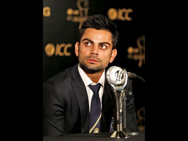 Virat Kohli, winner of the International Cricket Council (ICC)'s One Day International (ODI) Cricketer of the Year Award, poses with the trophy during the ICC Awards in Colombo. Reuters