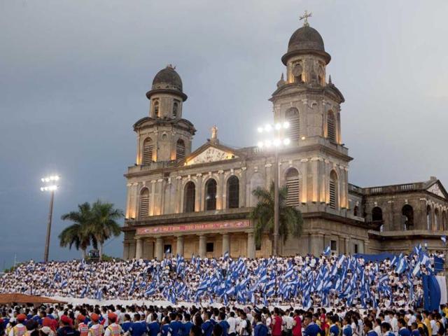 Students march past the old cathedral in a parade commemorating Independence Day in Managua, Nicaragua. Nicaragua celebrates 191 years of independence from Spain. AP Photo