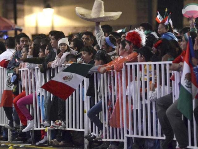 People gather to celebrate the 202nd anniversary of their independence from Spain at Zocalo square in downtown Mexico City. Reuters/Alan Ortega
