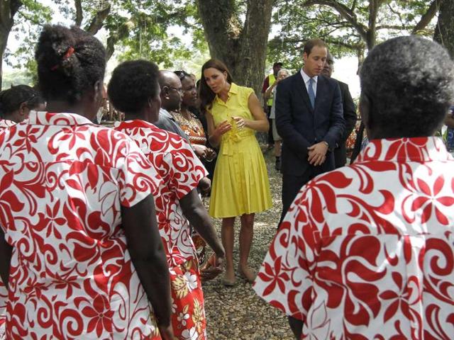 Britain's William and his wife Kate the Duke and Duchess of Cambridge, watch a traditional dance at the Cultural Village in Honiara, Solomon Islands. AP photo
