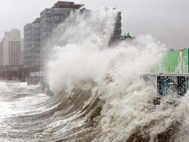 High waves caused by Typhoon Sanba crash on Haeundae beach in Busan, south of Seoul, South Korea. (AP Photo)