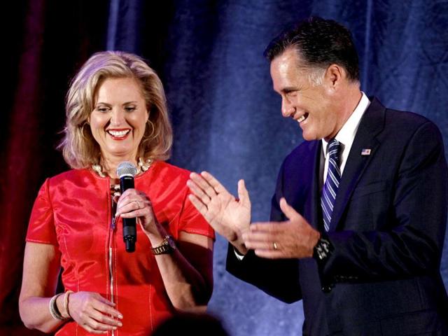 US Republican presidential nominee and former Massachusetts governor Mitt Romney applauds as his wife Ann speaks at a campaign fundraiser in Dallas, Texas. Reuters Photo