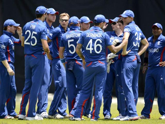 The England team including captain Stuart Broad congratulate each other after the dismissal of Pakistan's Mohammad Hafeez during a warm-up match at the P Sara oval in Colombo. Reuters/Philip Brown