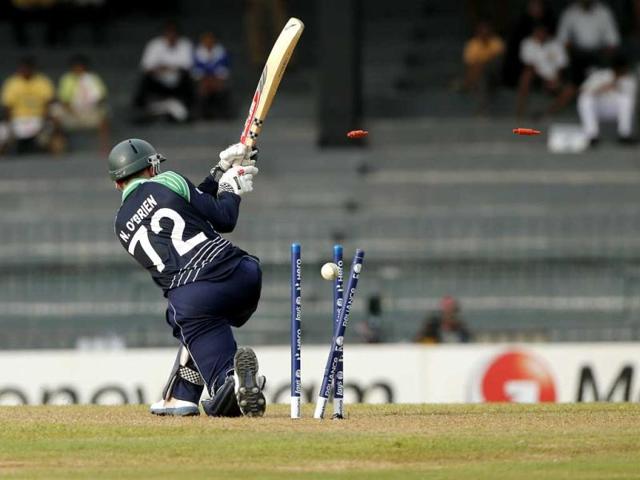 Bails fly off from the wicket of Ireland's batsman Niall O'Brien as he bowled out by Australian bowler Shane Watson, unseen, during their ICC Twenty20 Cricket World Cup match in Colombo. AP Photo