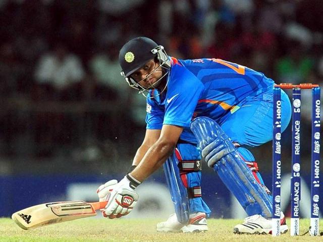 Suresh Raina plays a shot during the ICC Twenty20 Cricket World Cup match between India and Afghanistan at the R Premadasa Stadium in Colombo. AFP/Lakruwan Wanniarachchi