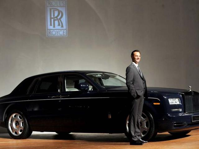Rolls-Royce Motor Cars, General Manger, Emerging Markets - Asia, Herfried Hasenoehrl poses with a Rolls Royce Phantom Series II car as it is unveiled to the media. AFP Photo